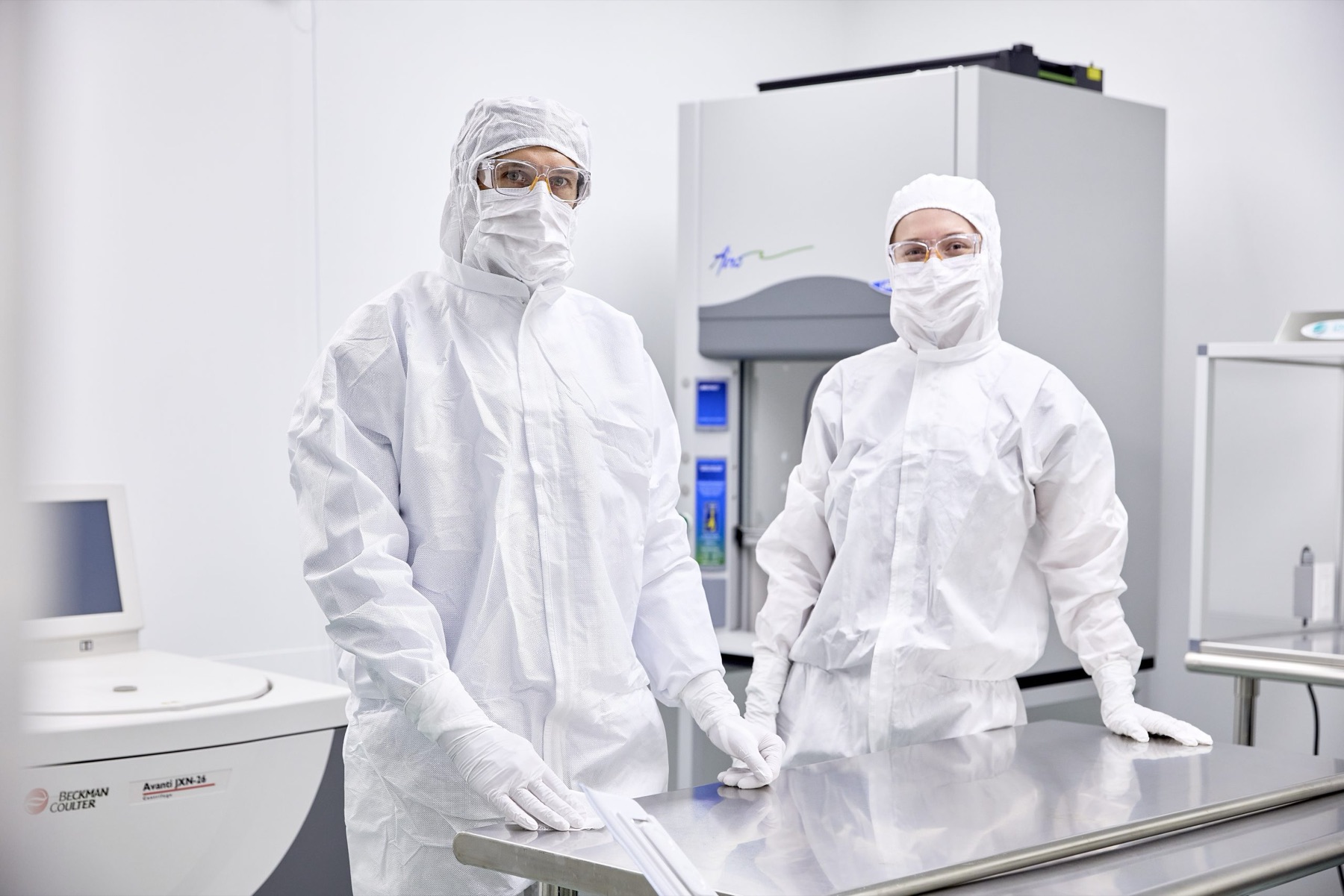 Cleanroom specialists in a controlled pharmaceutical facility